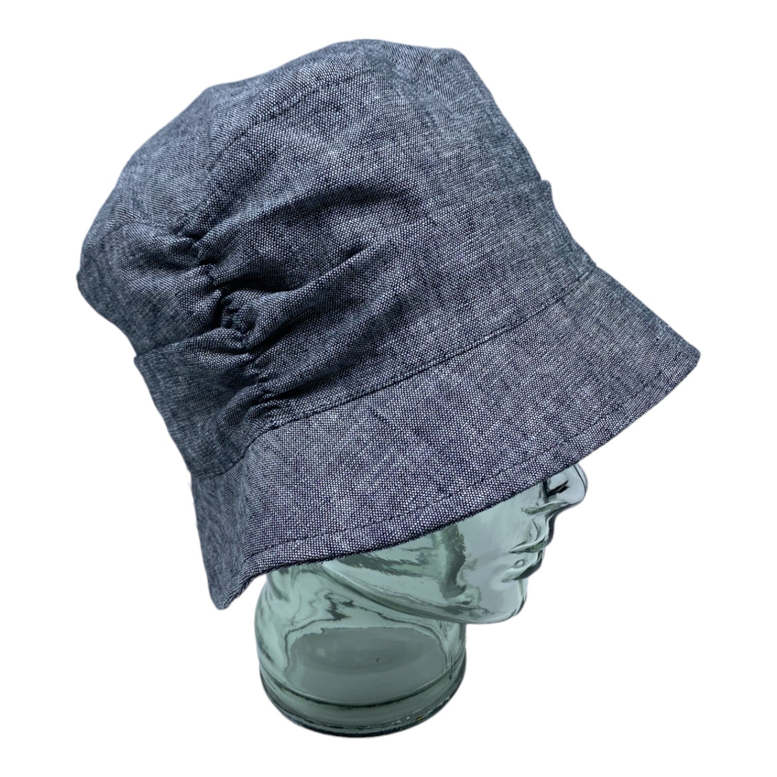 Chapeau cloche d'été en lin de qualité supérieure, ajustable avec protection solaire UV50+. Fait au Québec, Montréal, Canada par Geneviève Dostaler. Disponible en plusieurs couleurs. Parfait pour compléter votre look avec style et confort.