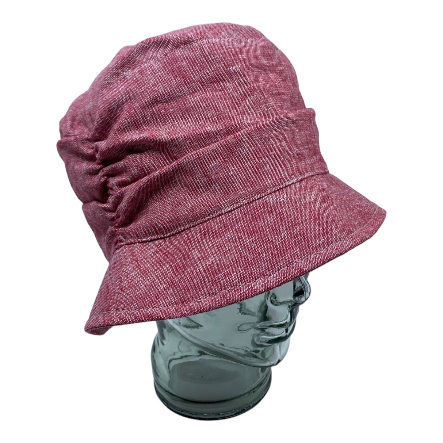 High-quality, adjustable linen summer cloche hat with UV50+ sun protection. Made in Quebec, Montreal, Canada by Geneviève Dostaler. Available in many colors. Perfect for completing your look with style and comfort.